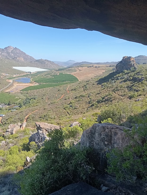 View over the valley from a rock overhang on a hike